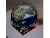 Deomnstration of Fraunhofer&amp;#039;s Augmented Reality system showing a virtual Earth globe on a marker. The system tracks the movement of the marker.
